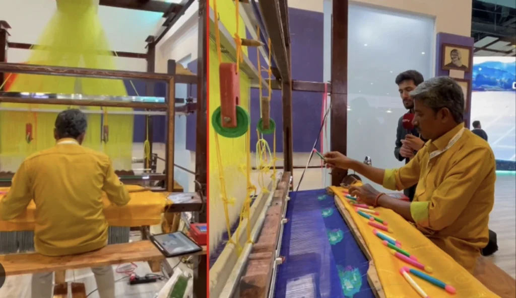 AI sari and fashion design robot showcasing automated fabric styling and smart textile technology at a robotics summit.