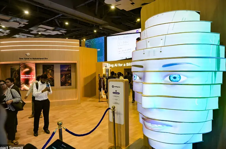 Interactive AI installation and visitors exploring technology exhibits at the AI impact summit 2026 India showcasing innovation at Bharat Mandapam.